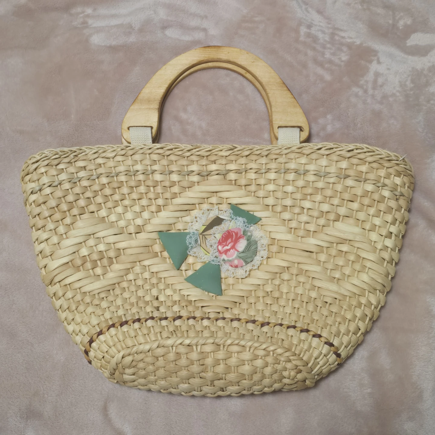 Woven straw tote bag with wooden handles