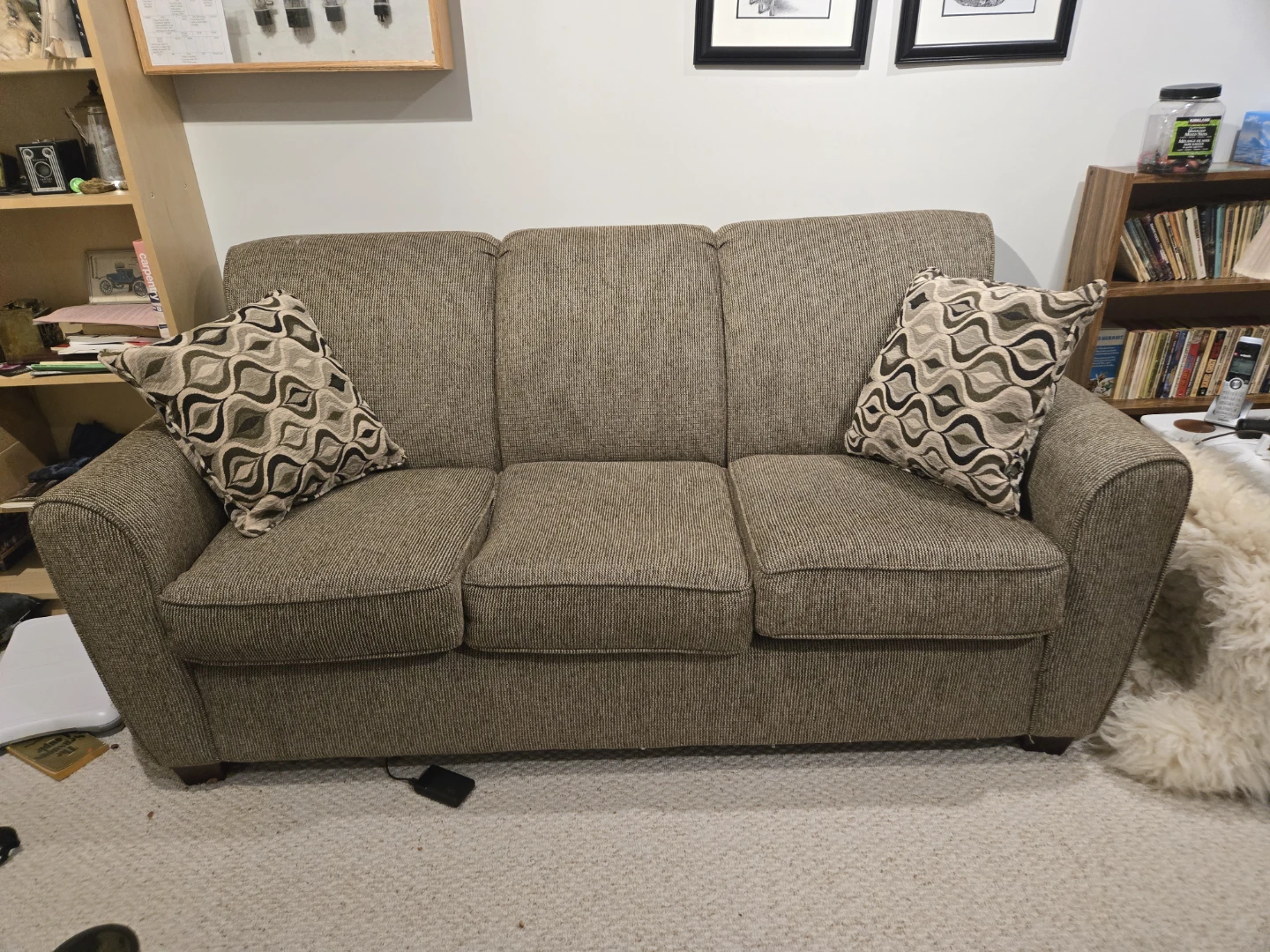 Sofa with patterned throw pillows
