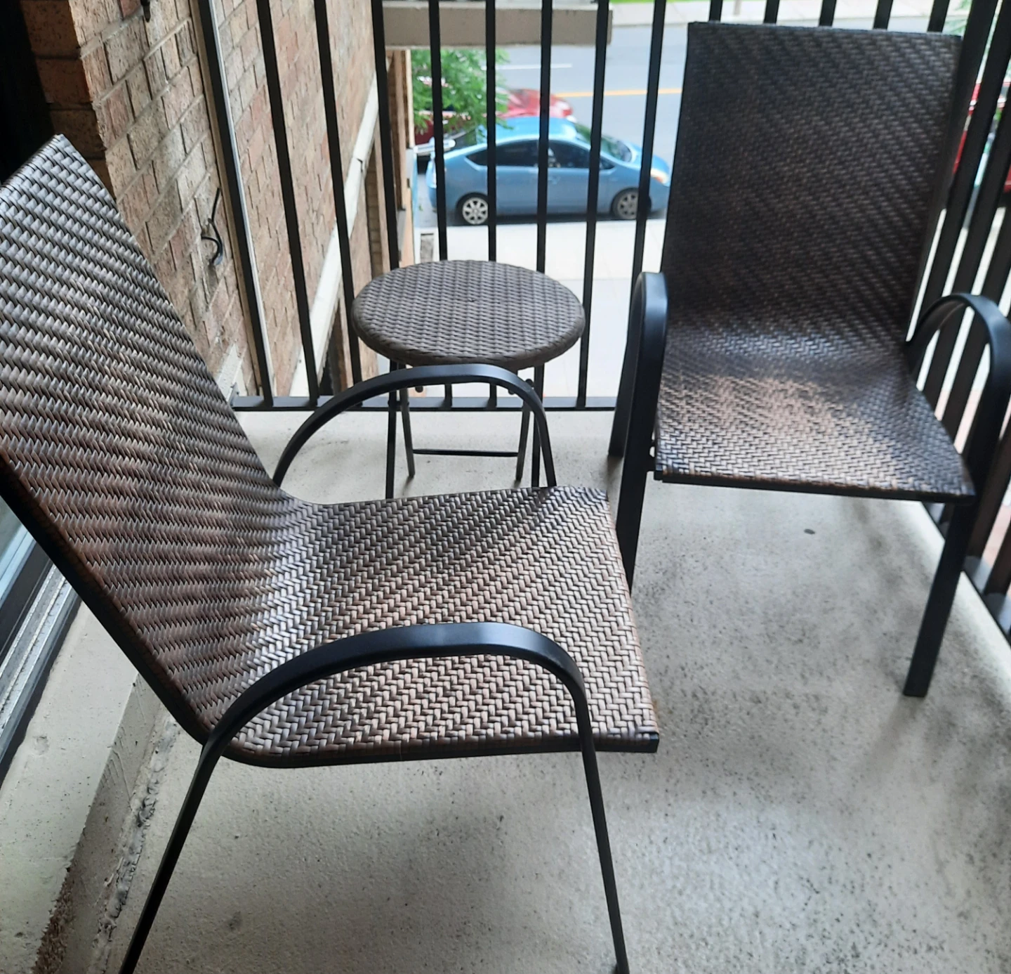 Wicker patio chairs and small table set