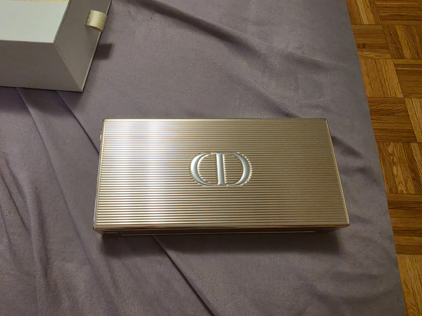 Dior gold clutch holiday 2023 collection
