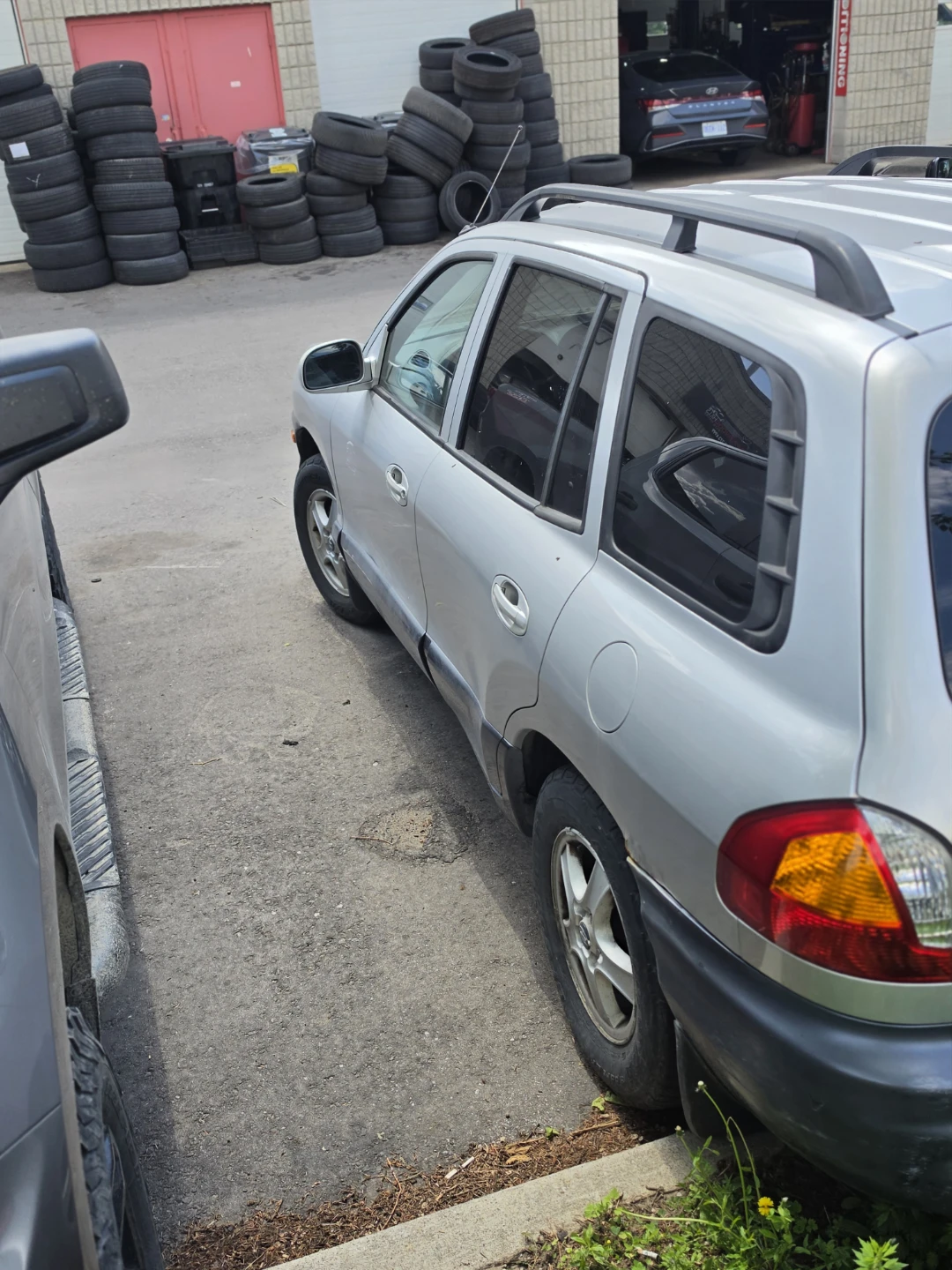 Silver Hyundai Santa Fe SUV - photo 2