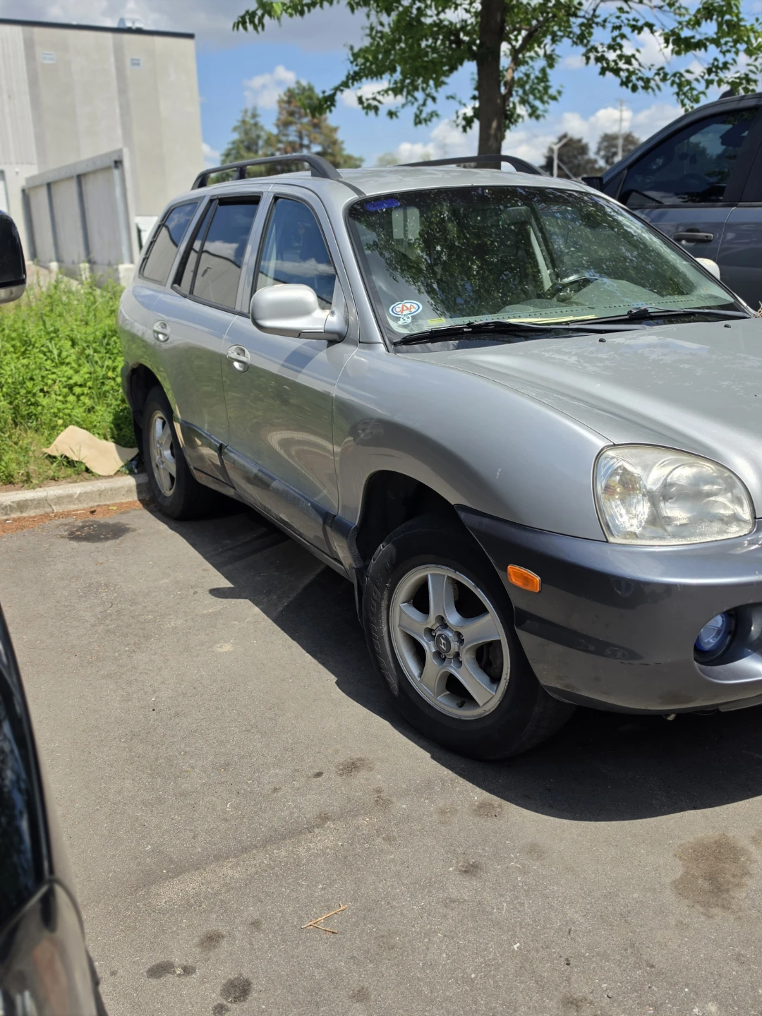 Silver Hyundai Santa Fe SUV - photo 3