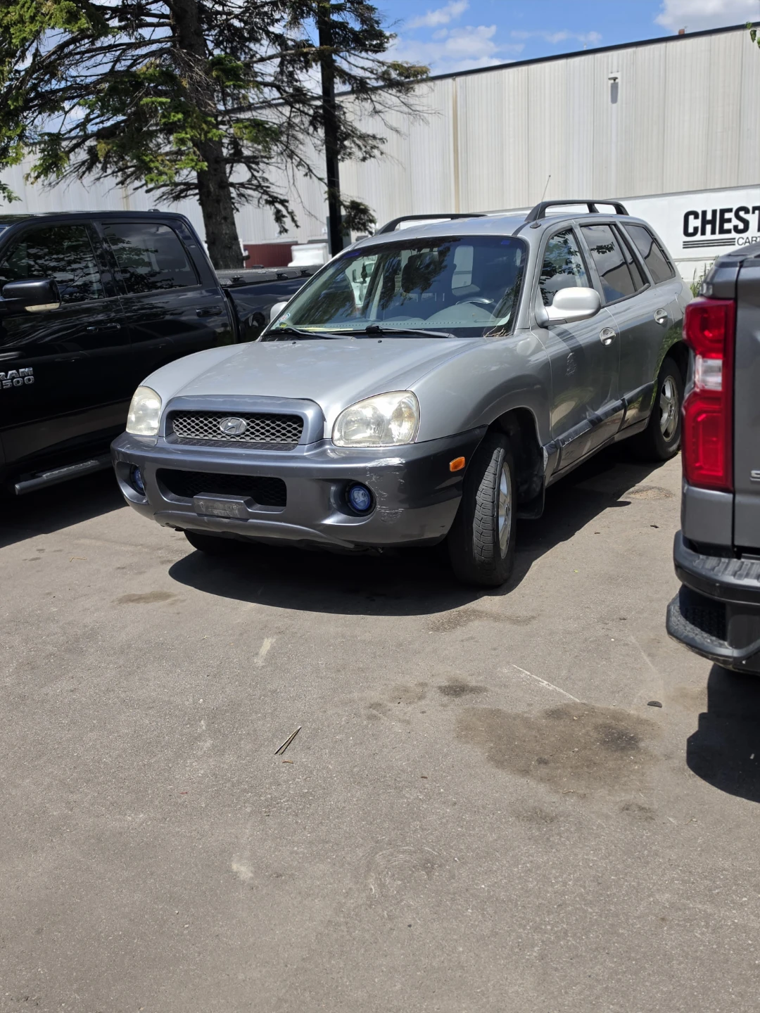 Silver Hyundai Santa Fe SUV - photo 4