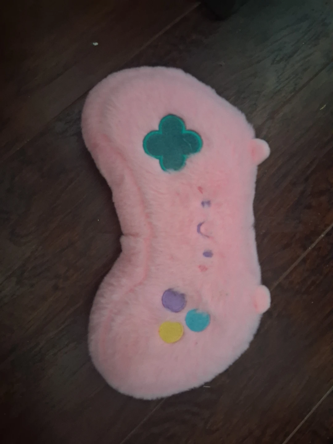 Plush pink controller-shaped stuffed animal