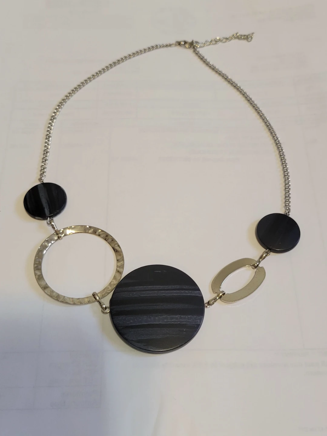 Silver tone and black statement necklace