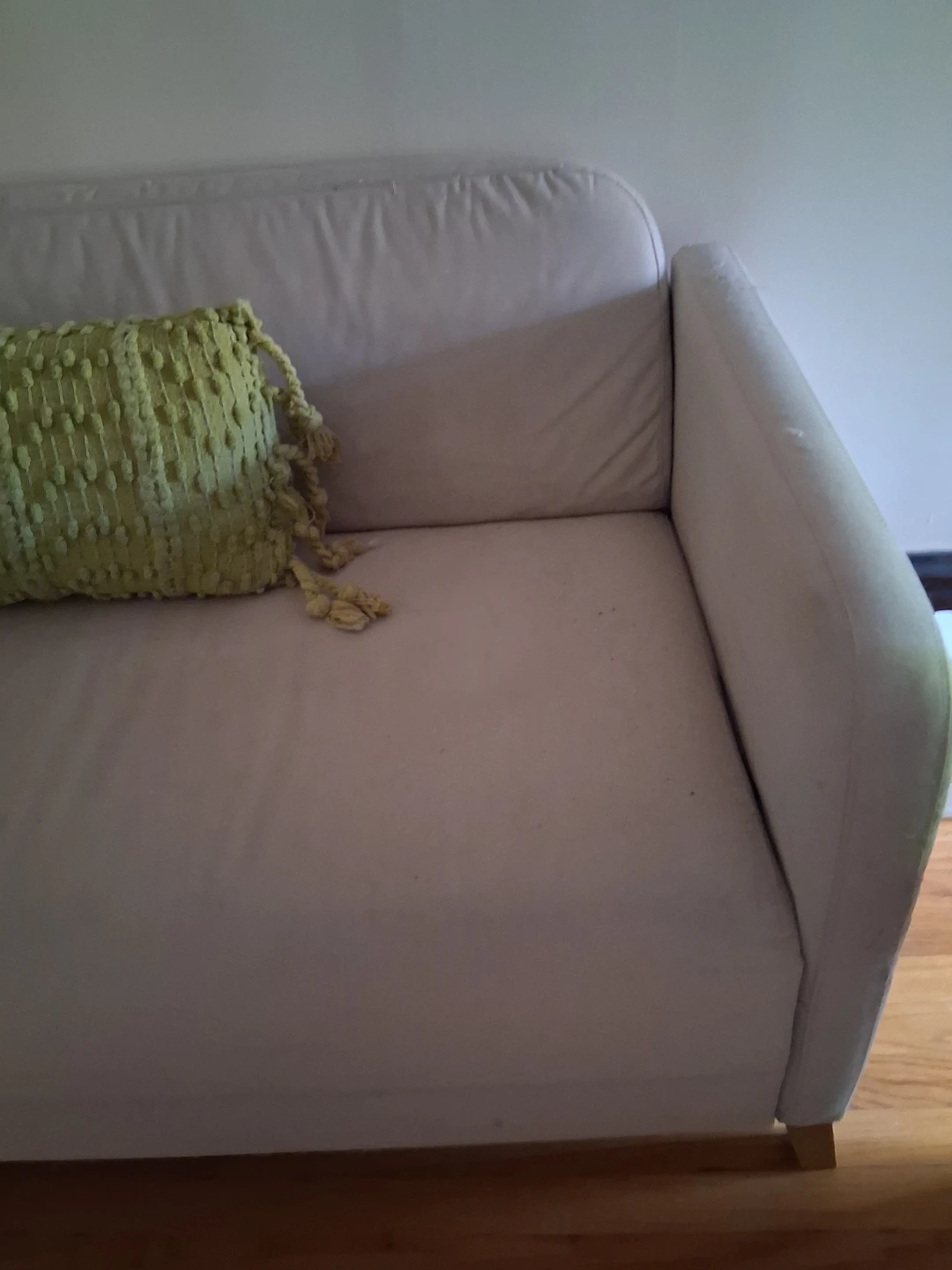 Cream Sofa with Bolster Pillow