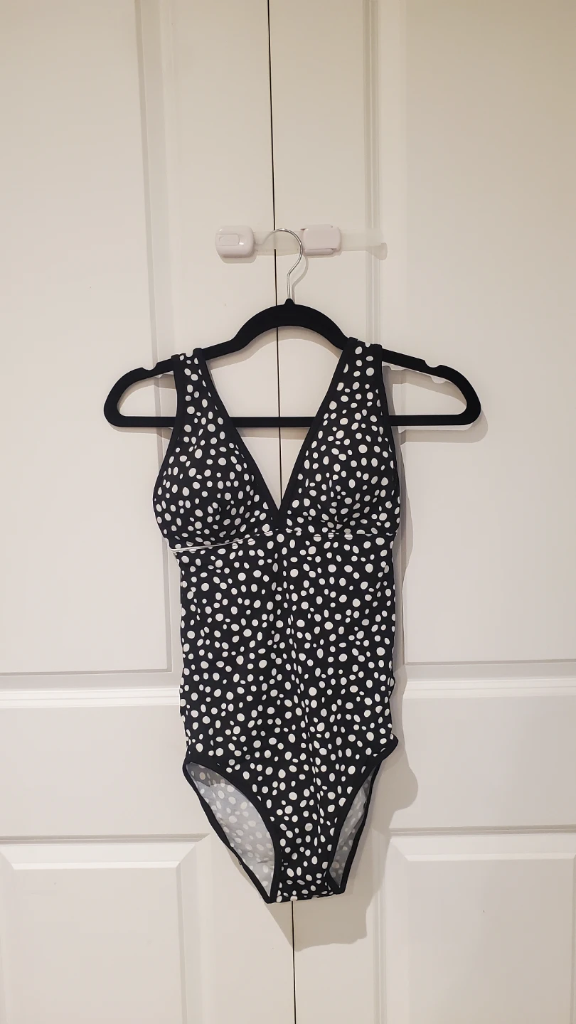 Black and white polka dot one-piece swimsuit