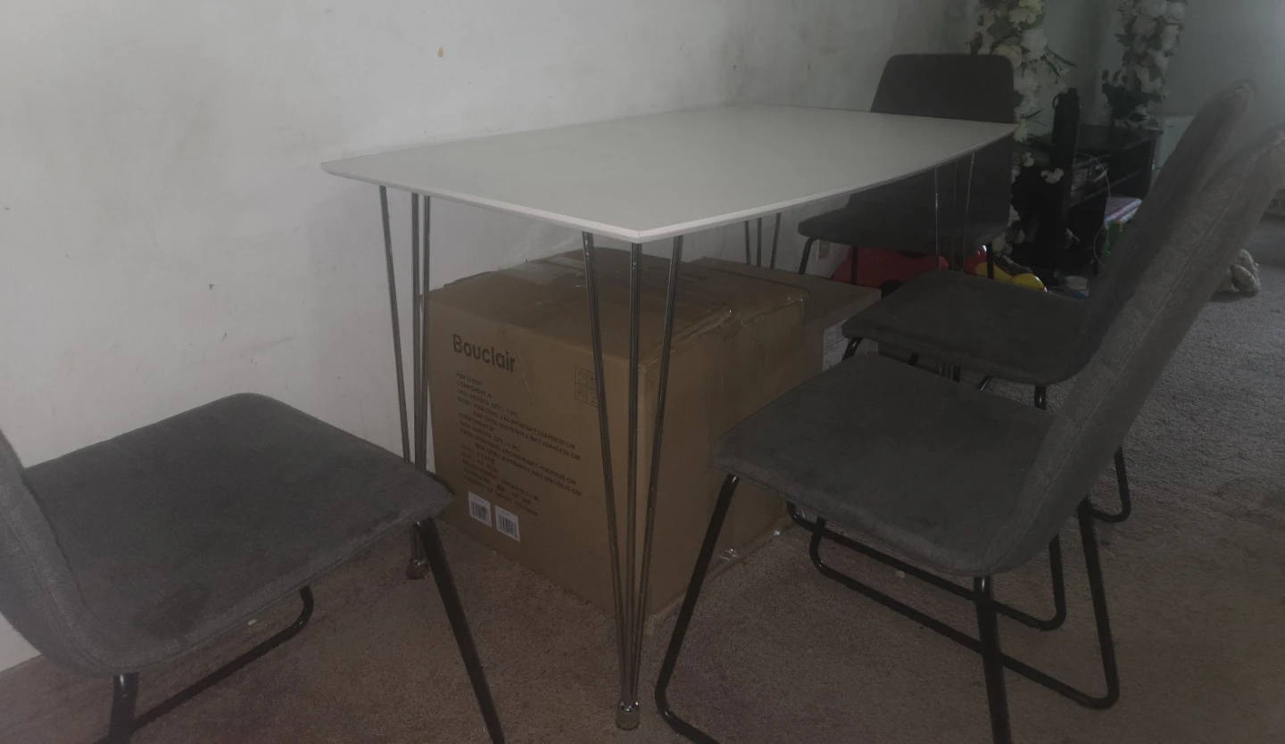 White Dining Table with Grey Chairs