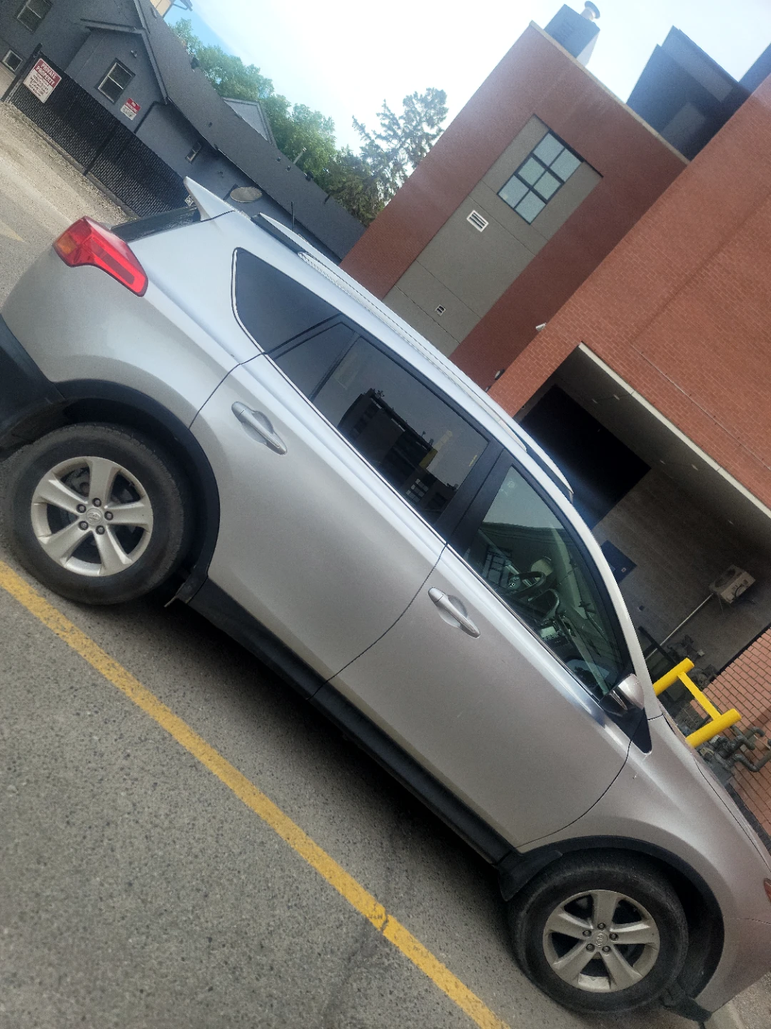 Silver Toyota RAV4 SUV - photo 2