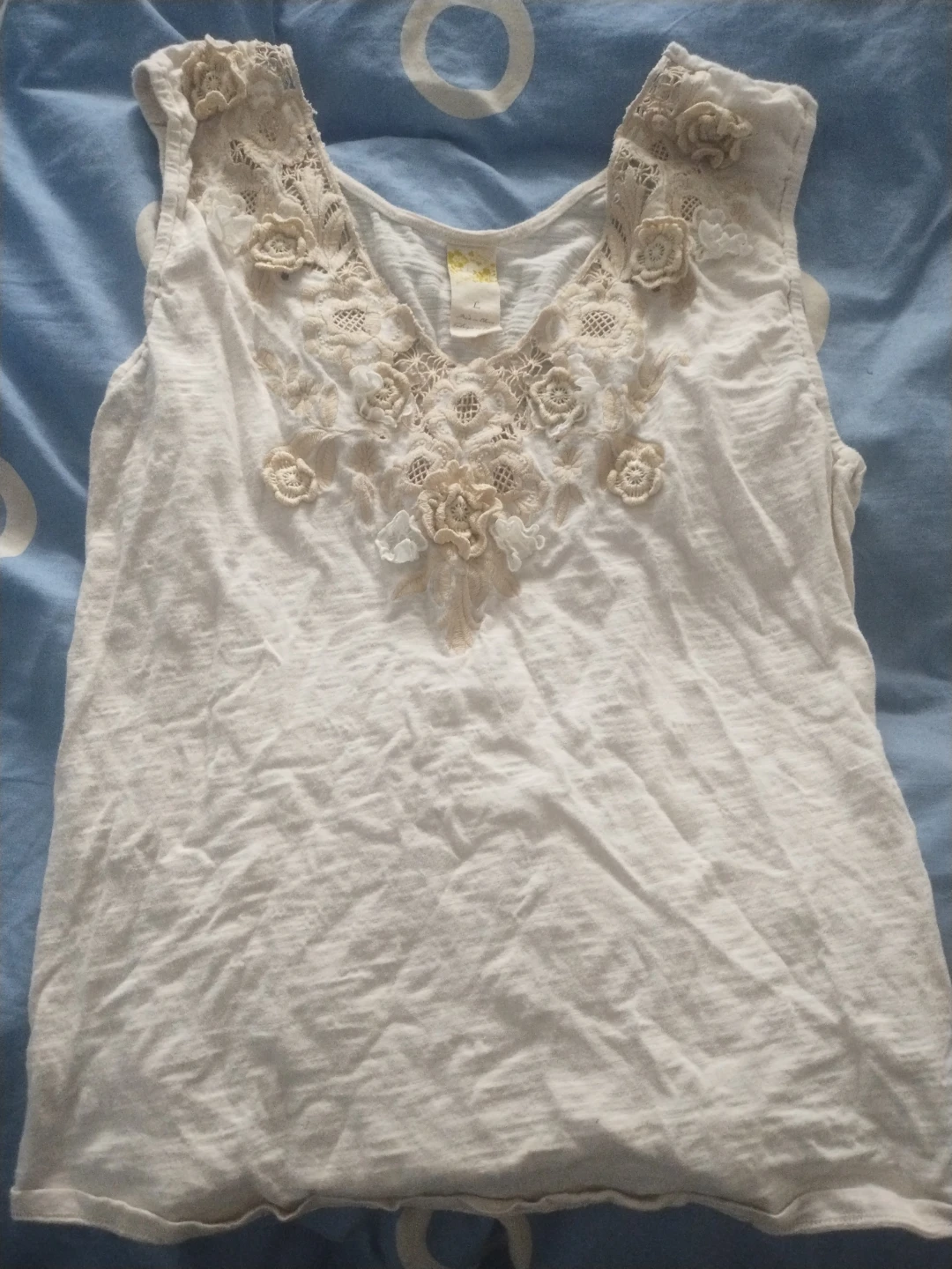 White Sleeveless Top with Floral Appliques