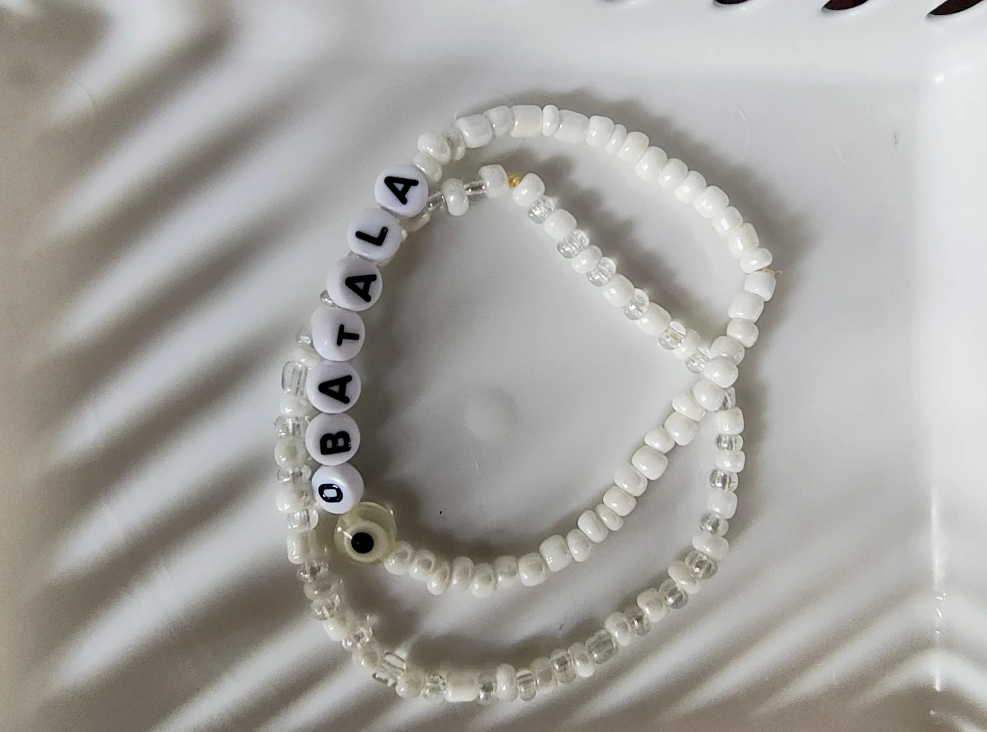 Hand made White Beaded Bracelet with "OBATALA" Name