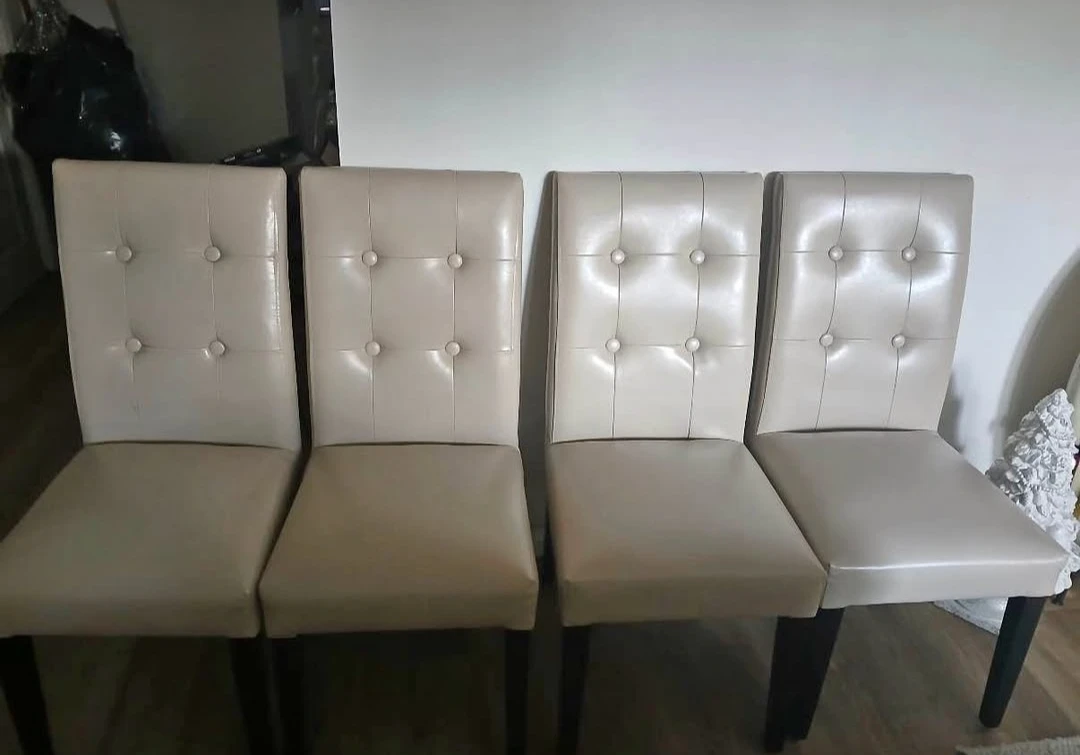 Almost brand new leather dining chairs
