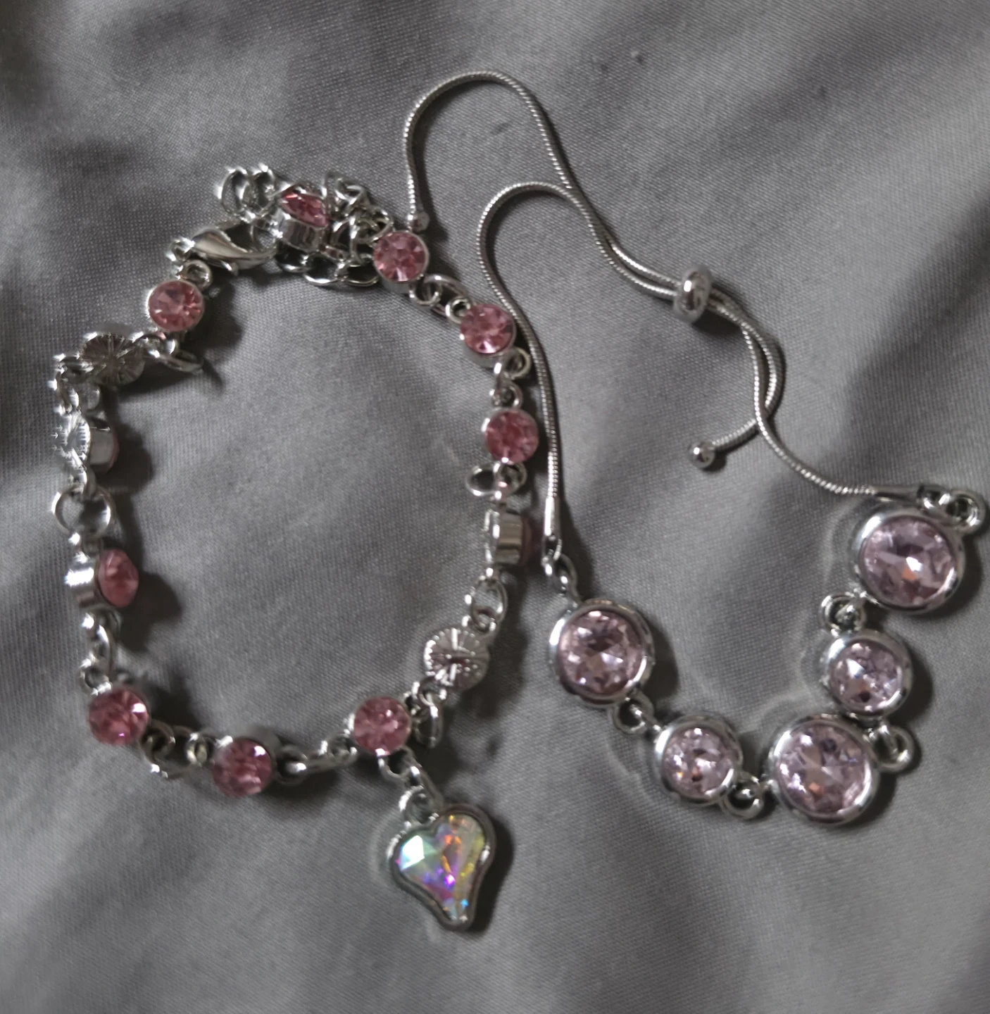 Silver Tone Bracelet with Pink Gems and Heart Charm