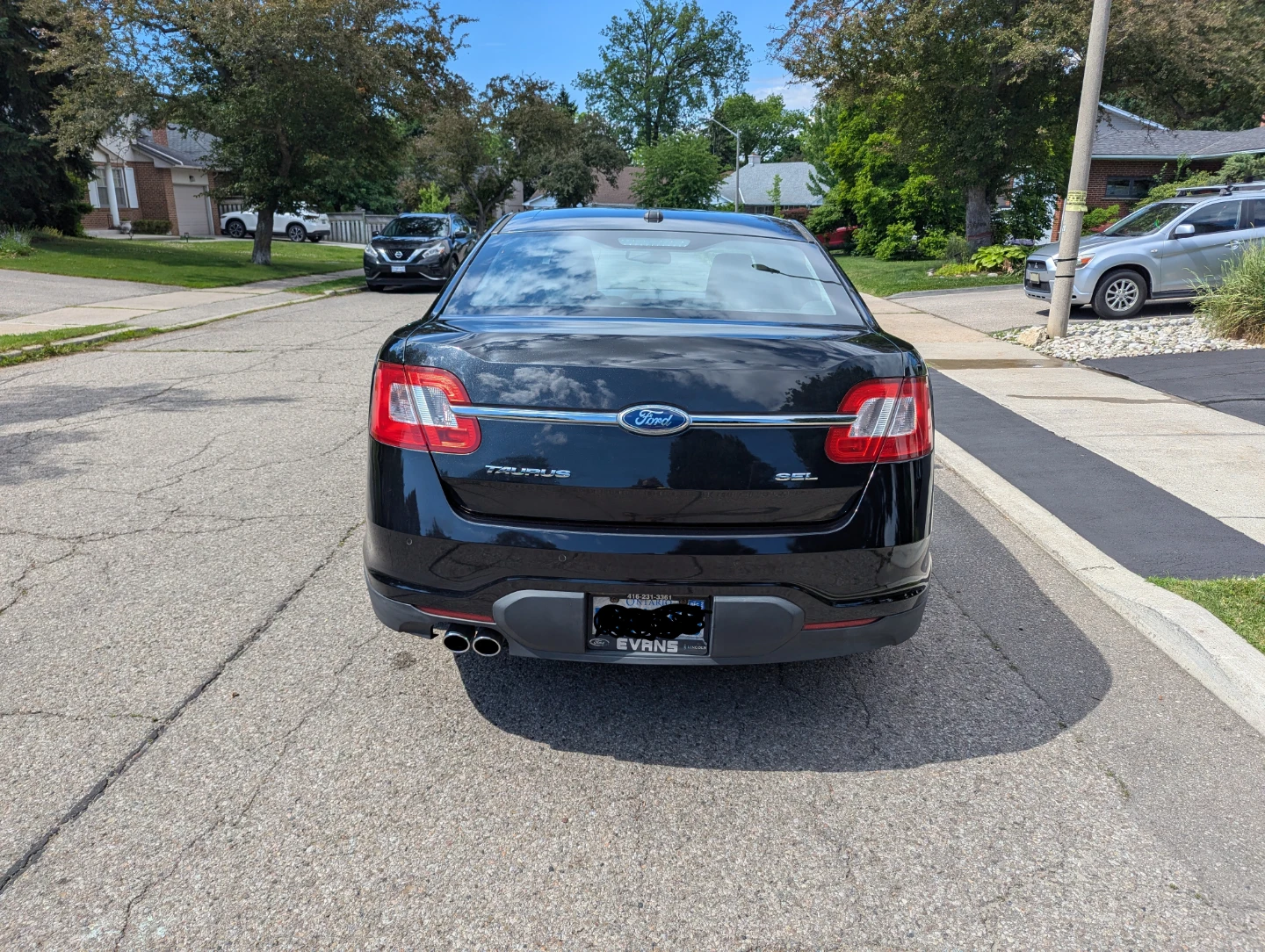 Black Ford Taurus SEL Sedan - photo 3
