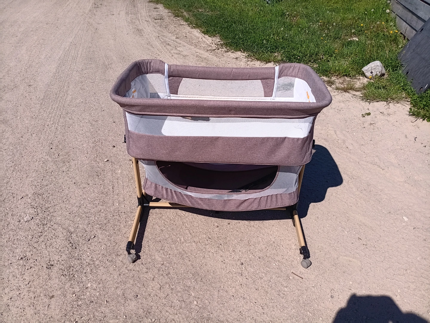 Brown Bassinet with Wheels