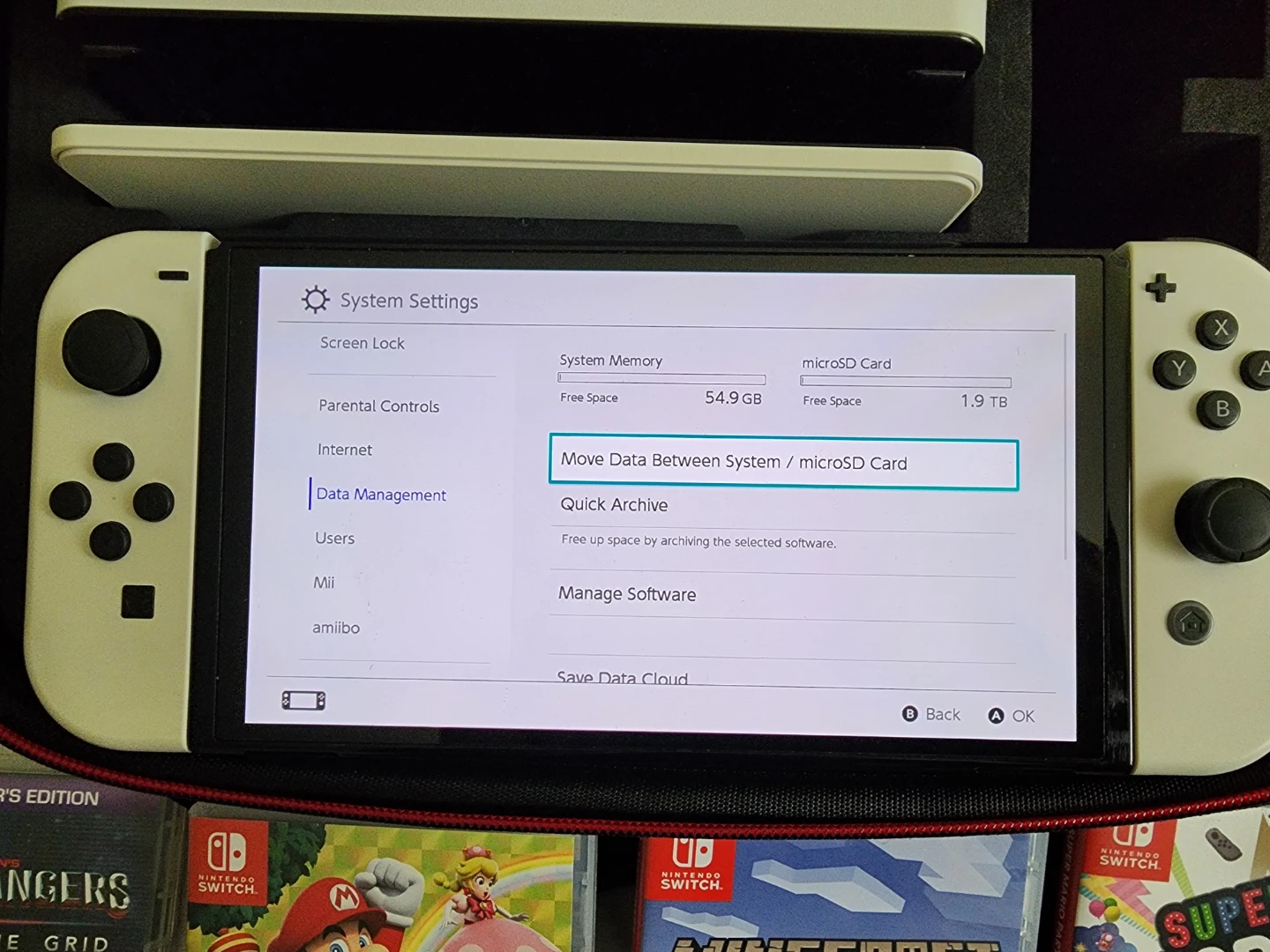 OLED Nintendo Switch Bundle with 13 Games and Accessories - photo 2