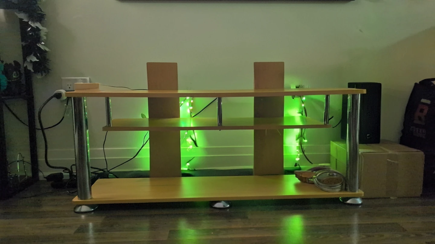 Wooden media stand with metal legs