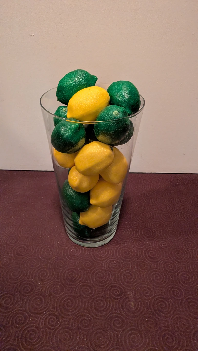Decorative Lemons and Limes in Glass Vase