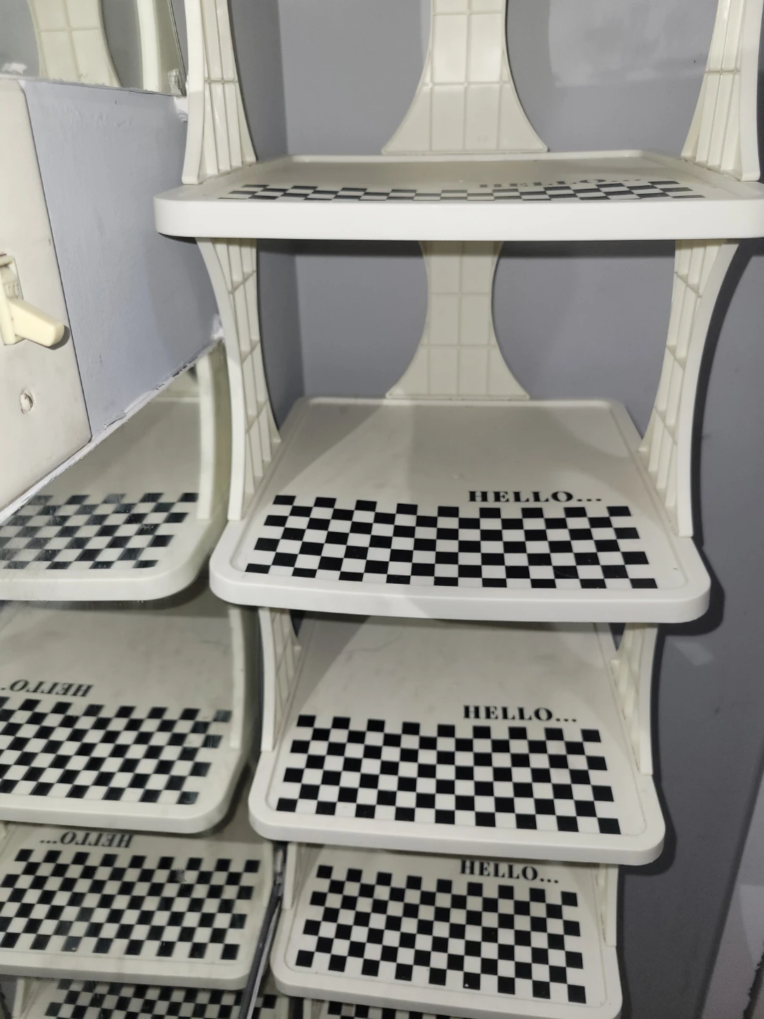 White 4-Tier Shelf Unit with Checkered Design