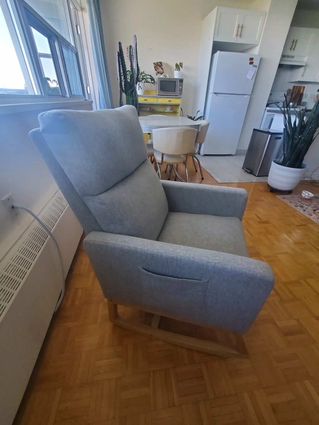 Grey Upholstered Rocking Chair with Side Pockets