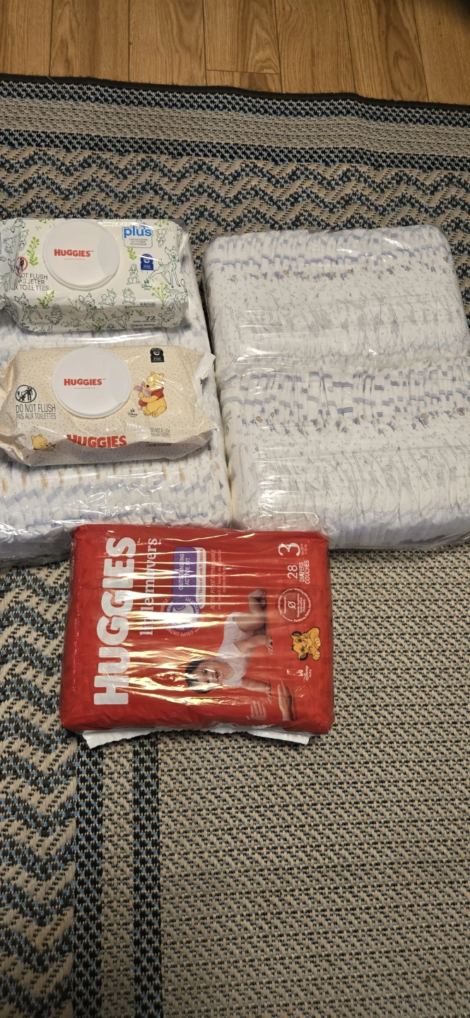 Huggies Little Movers Diapers , size 3 8and Wipes