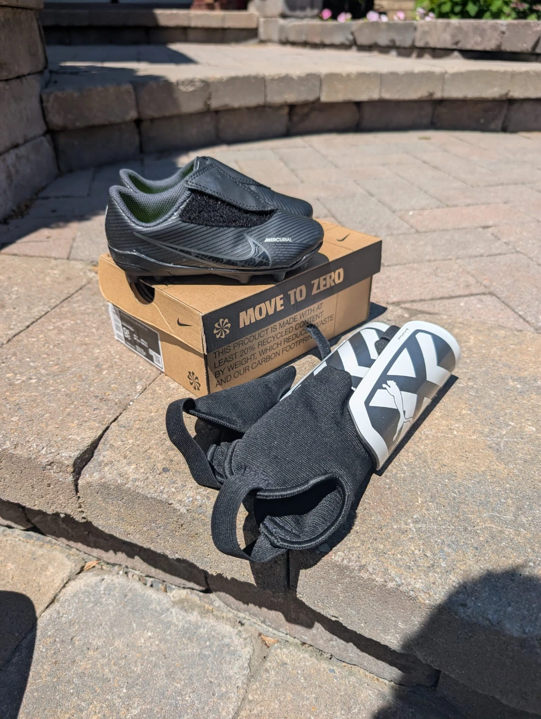 Boys Nike Mercurial Soccer Cleats and shin guards