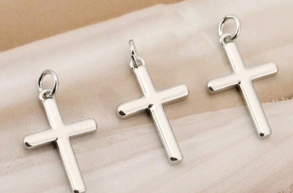 Silver-tone Cross Pendants.