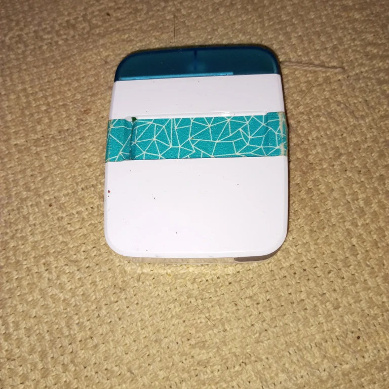White Power Bank with Teal Accent Band