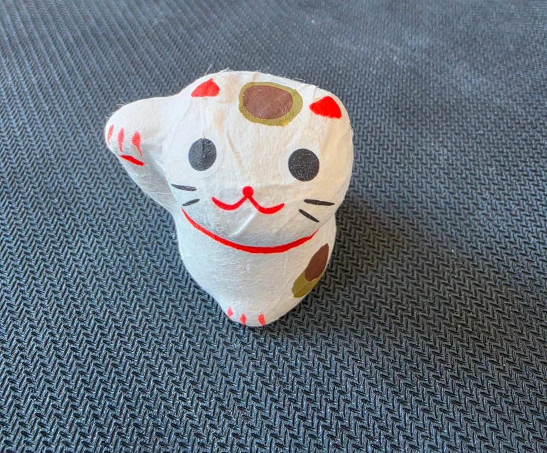 Paper mache lucky cat