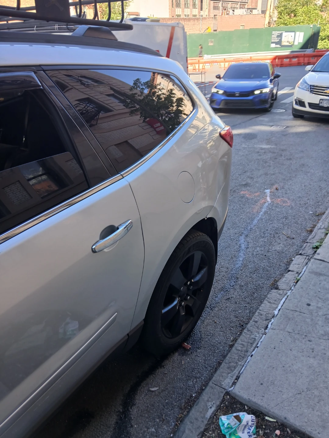 Silver Chevrolet Traverse with Roof Rack