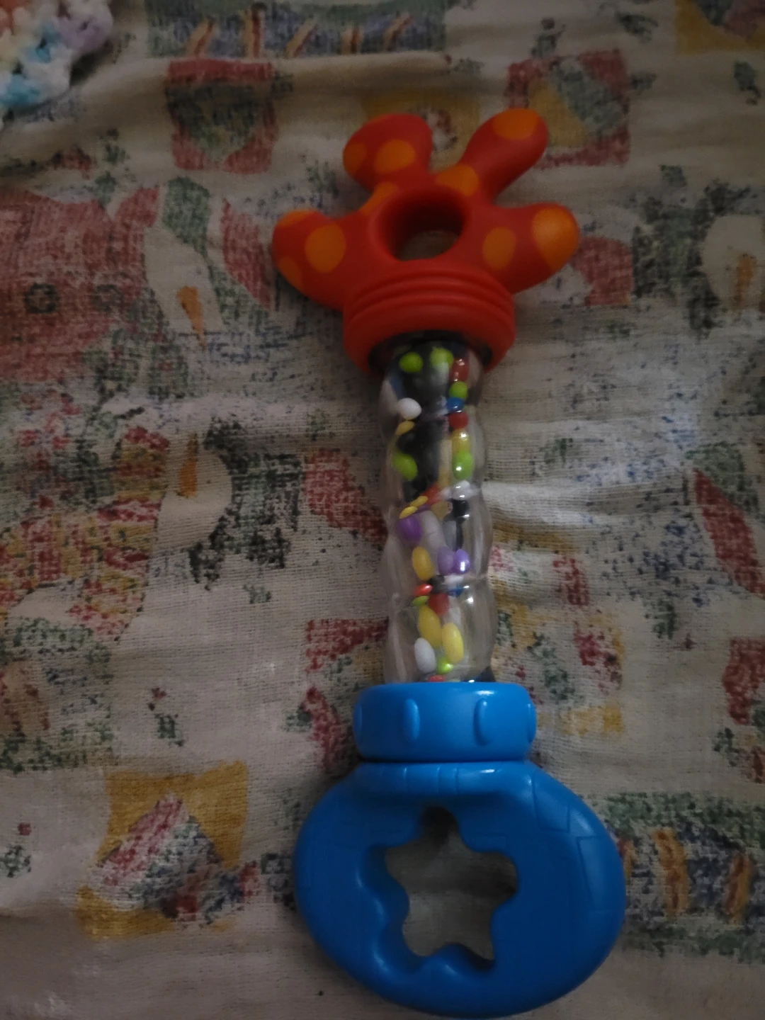 Playgro "Grab and Shake" rattle with a distinctive