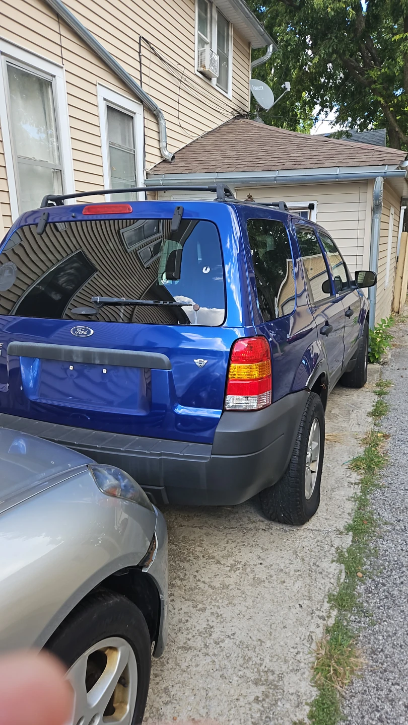 Blue Ford Escape SUV - photo 2