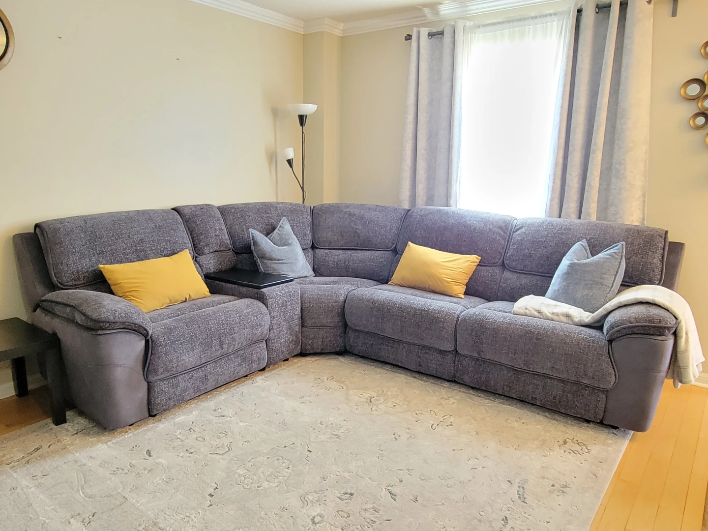 Blue reclining sofa with console
