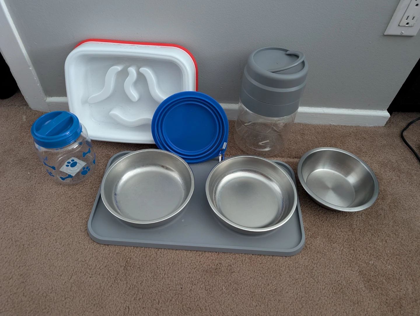 Lot of dog dishes for home or travel
