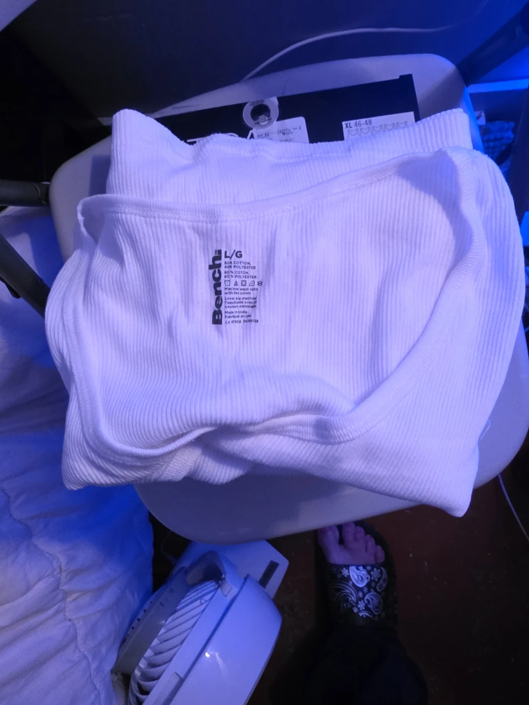 Bench. White ribbed tank top