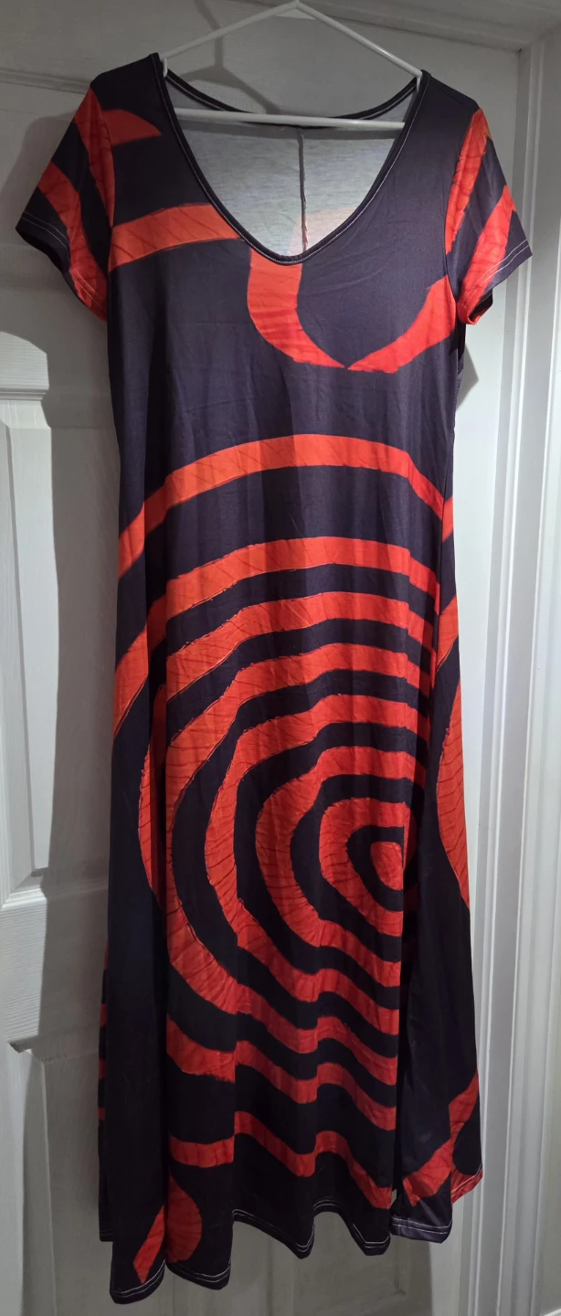 Brand new woman's long dress Size Medium.