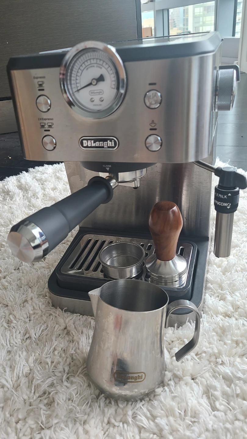 DeLonghi Espresso Machine, steam milk cup and tamper included
