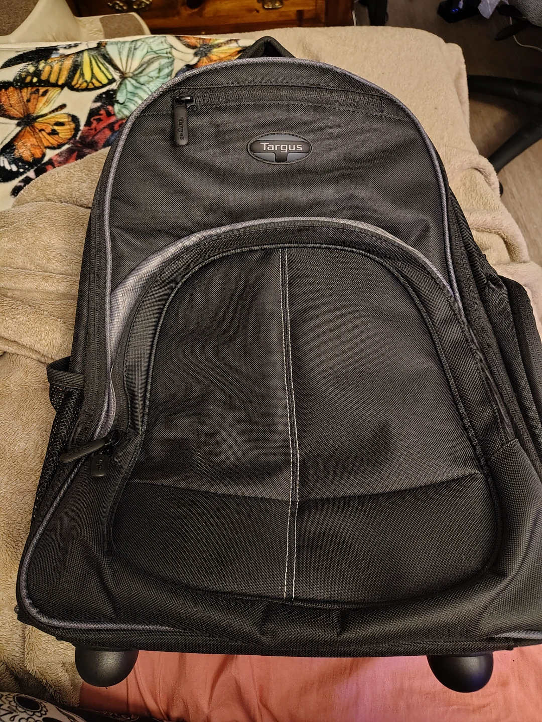 Rolling black backpack