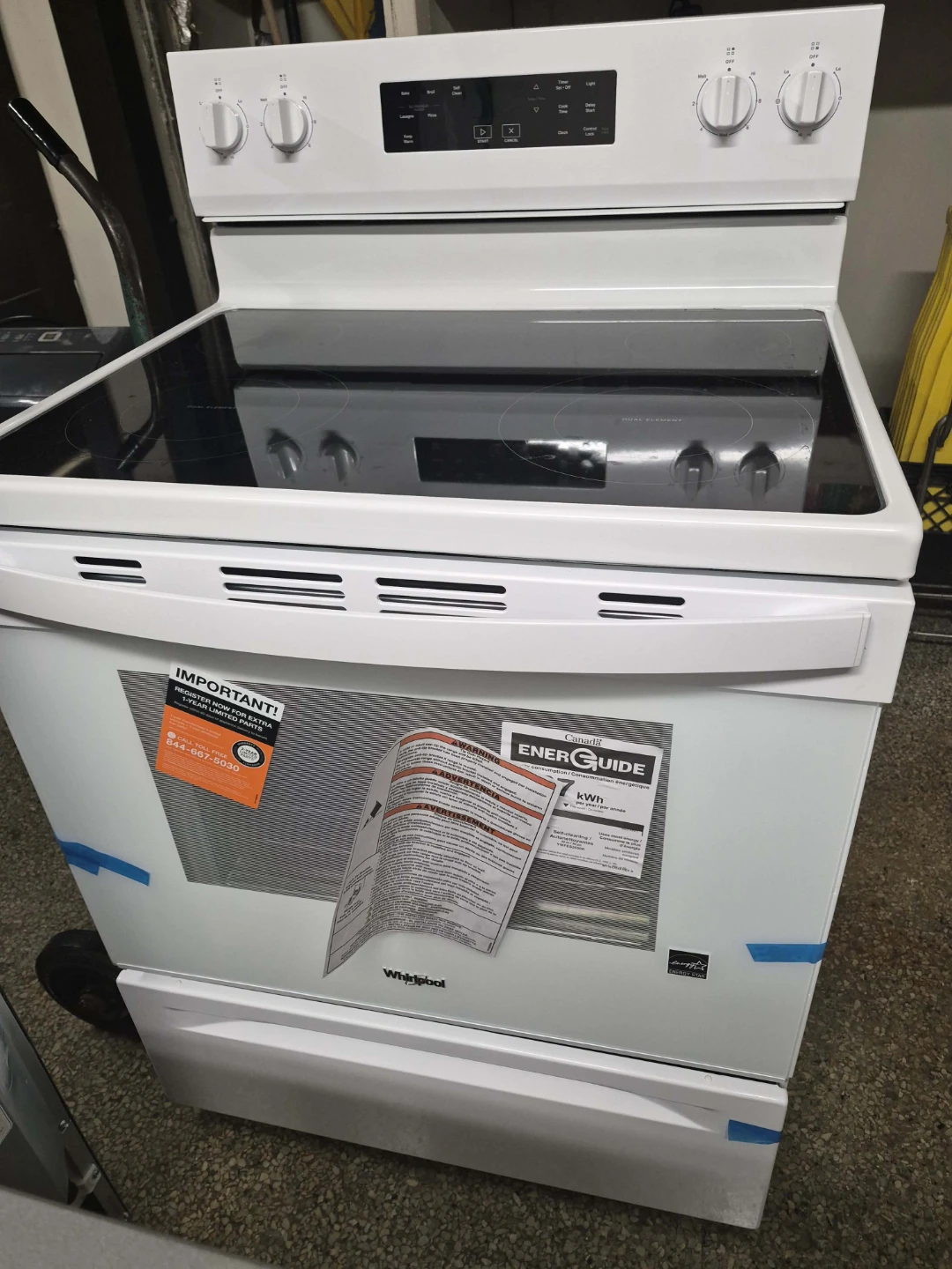 White Whirlpool Electric Stove with Glass Cooktop