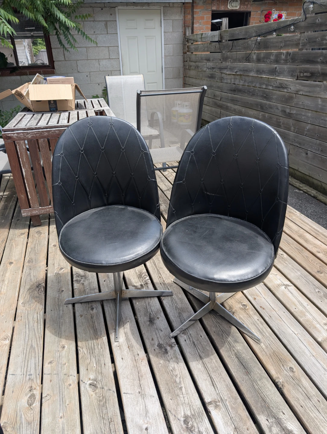 Pair of Black Swivel Chairs