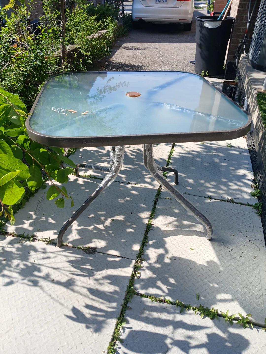 Glass top patio table