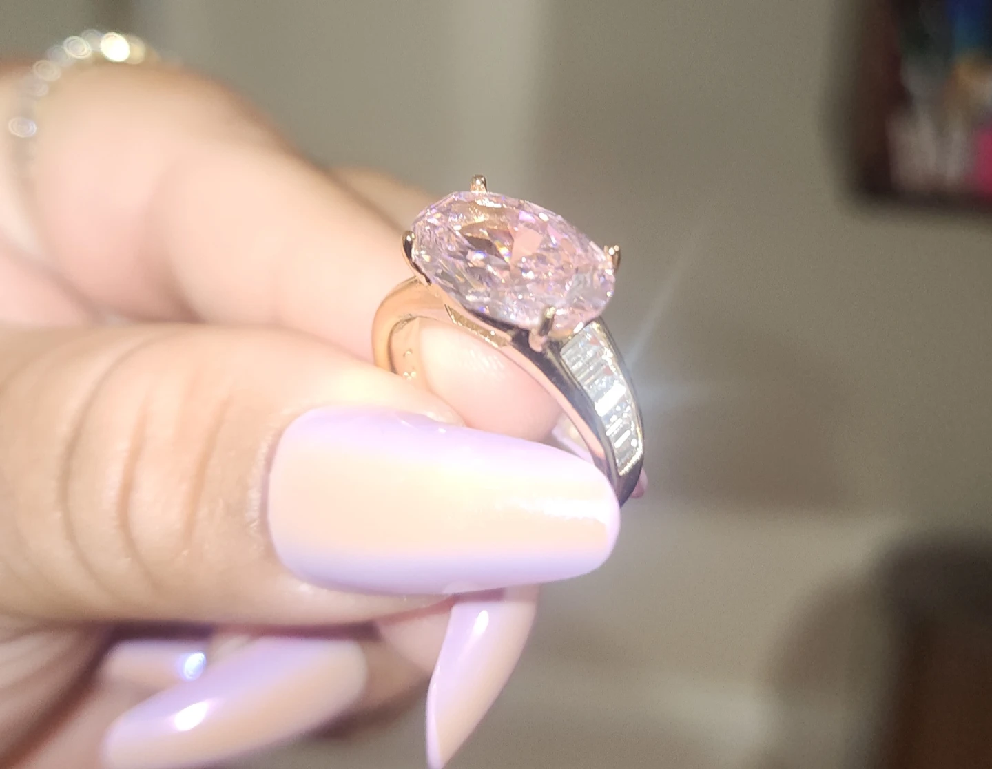 Gold platted Pink Oval Cut Ring with Baguette Accents