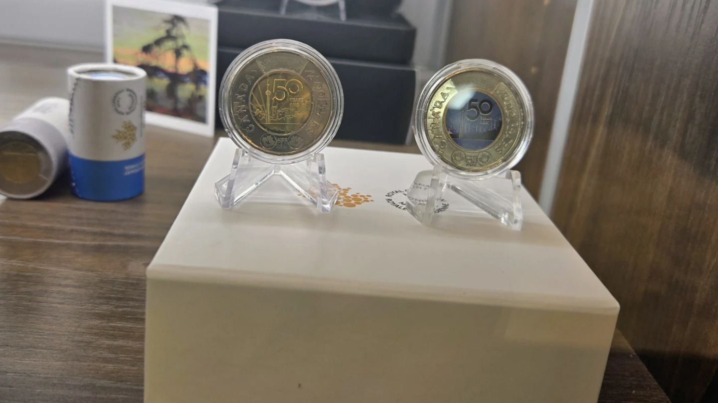 CN Tower & 50 Years coin pair.