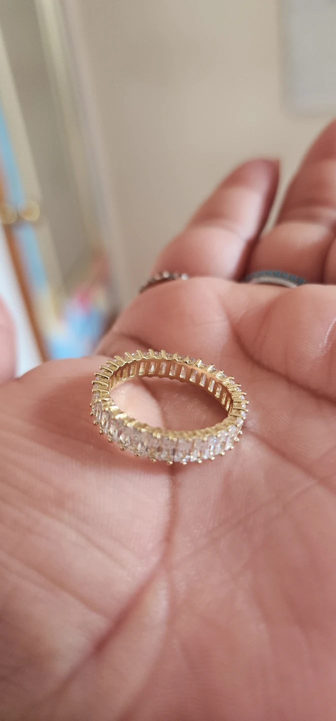 Gold platted eternity band ring with clear baguette stones - photo 4