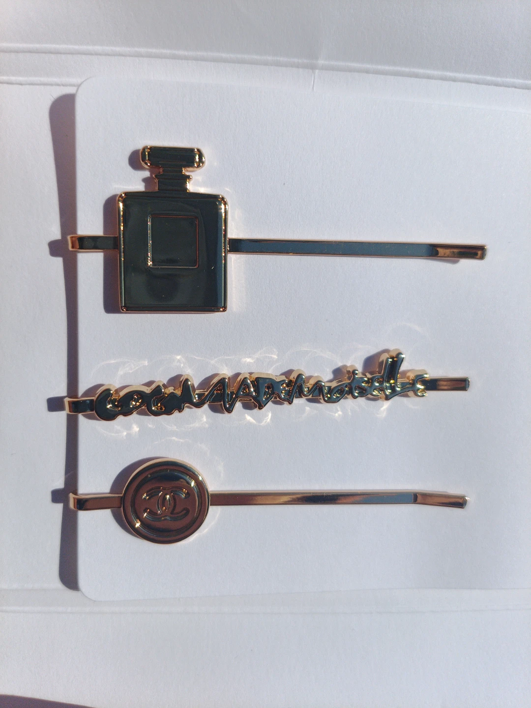 Gold Hair Pins Set with Chanel Logo and Perfume Bottle Design