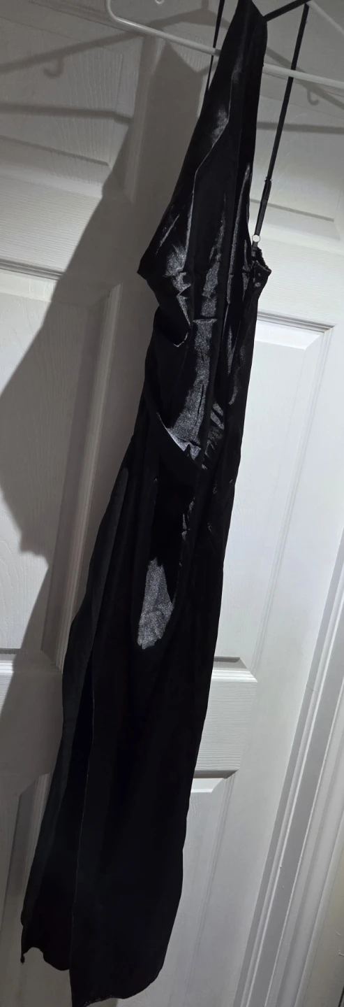 Brand new Black  Dress size medium  fits  small