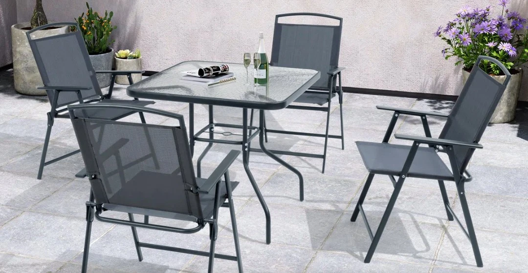 Outdoor patio dining set with glass top table and 4 chairs
