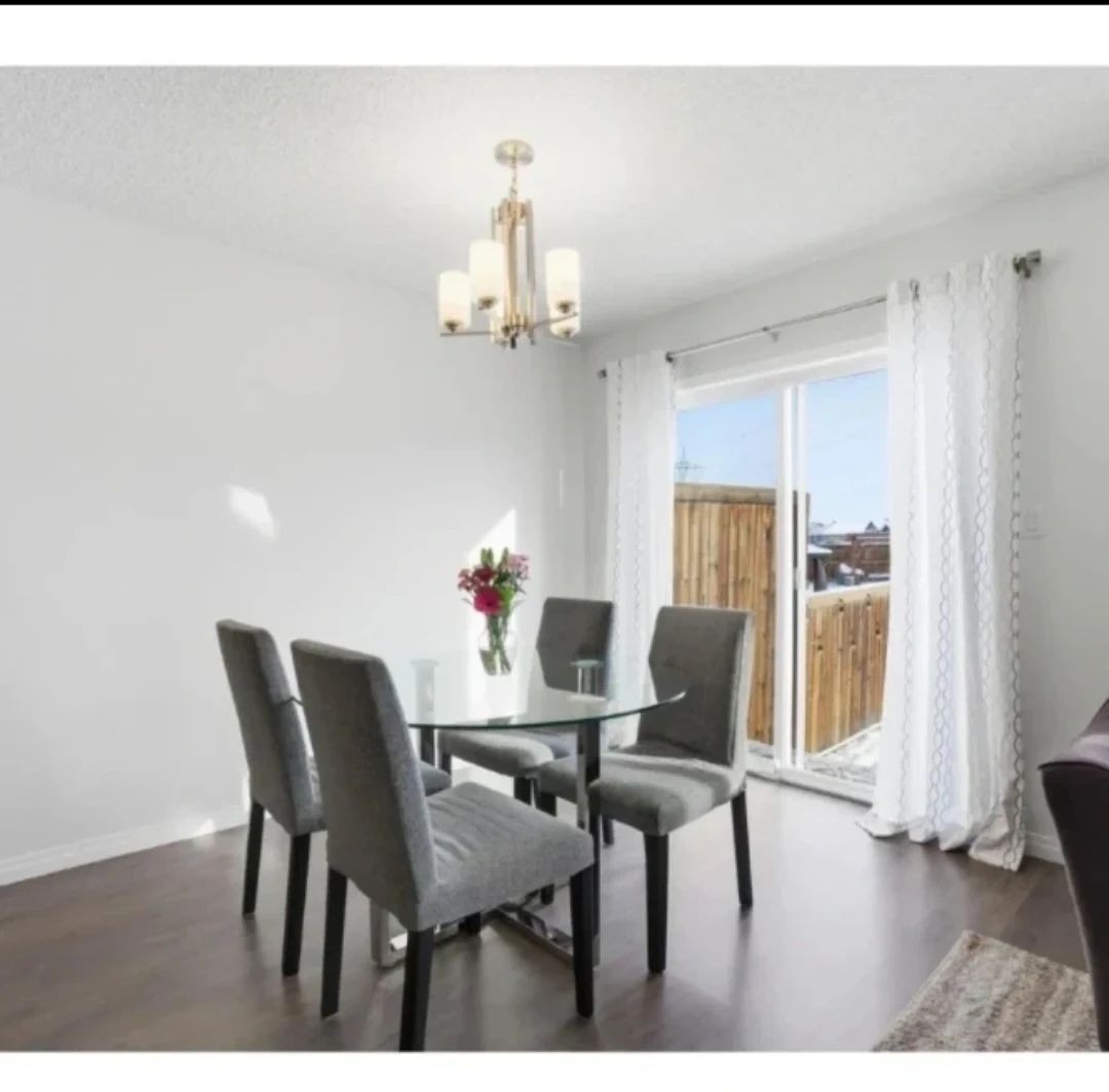 Glass dining table with 4 chairs