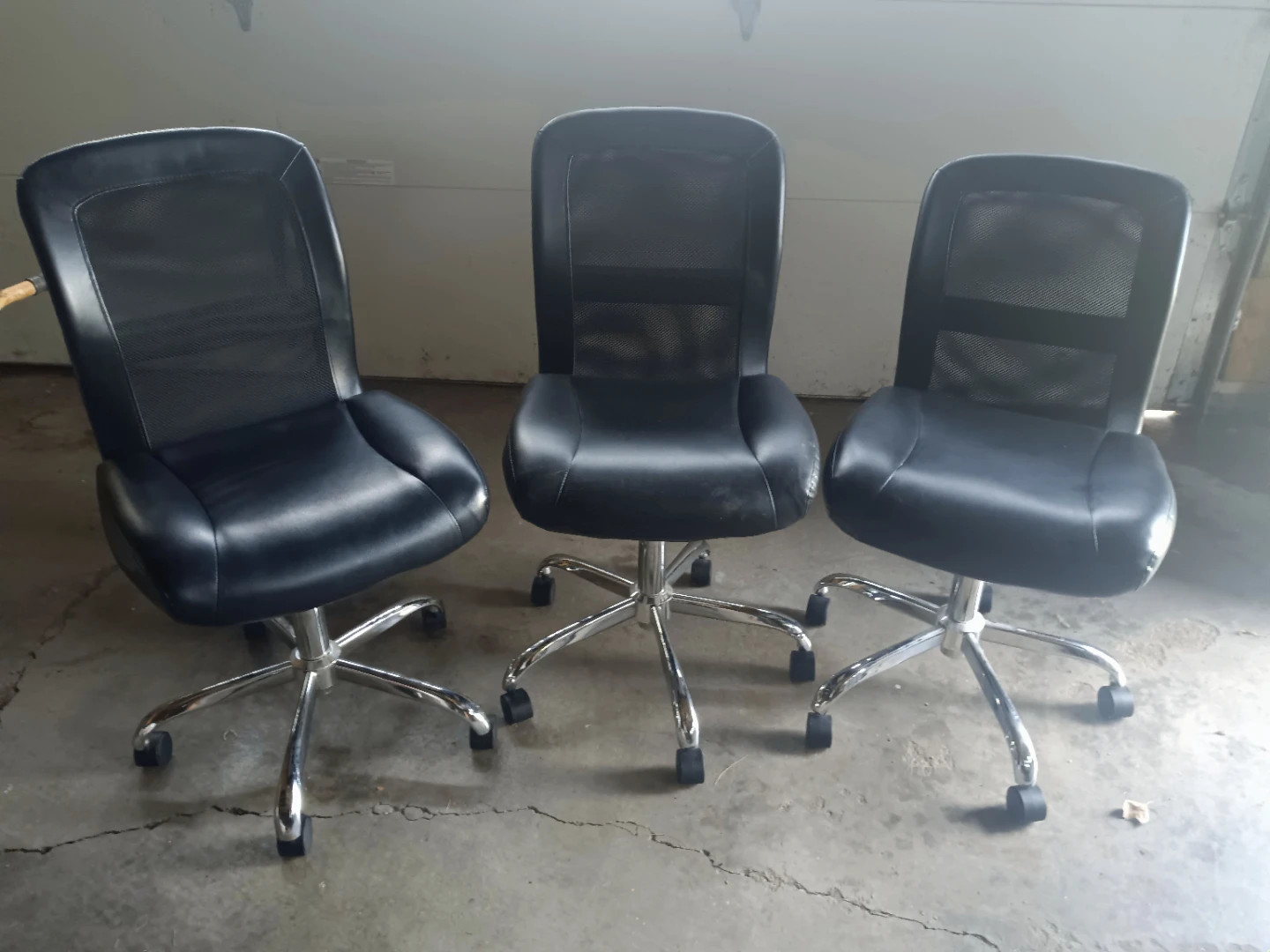 Black rolling office chairs