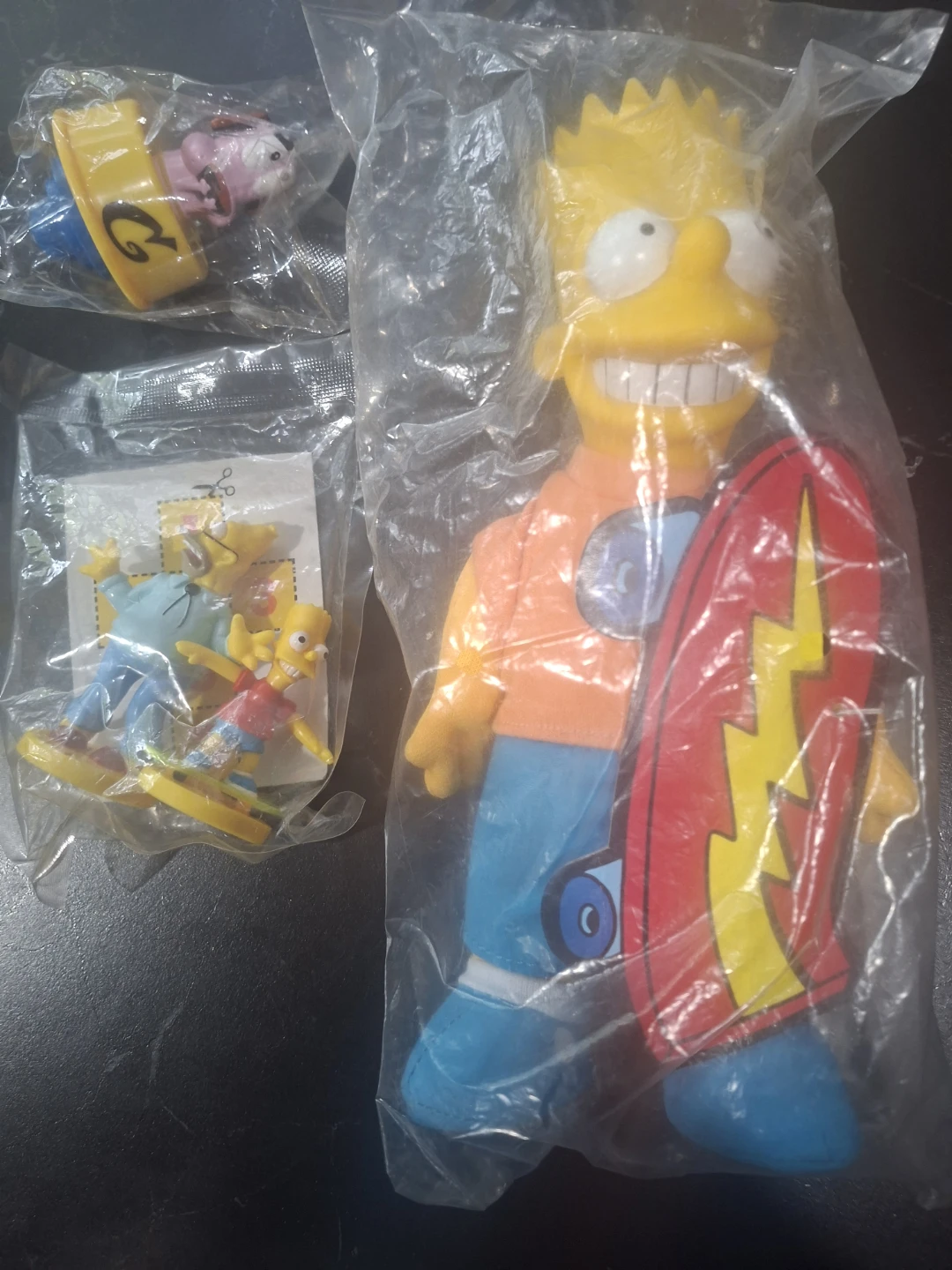 Old still in original packaging toys Bart Simpson and more